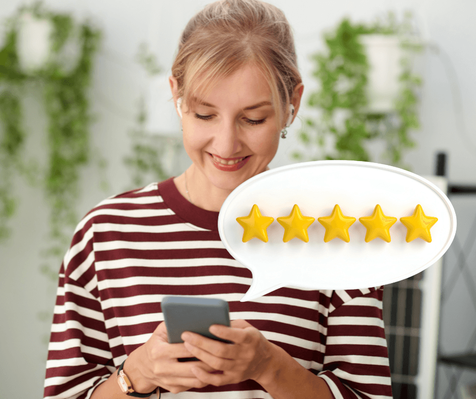 Small business owner checking Google reviews on a phone — guide to getting more Google reviews in 2025